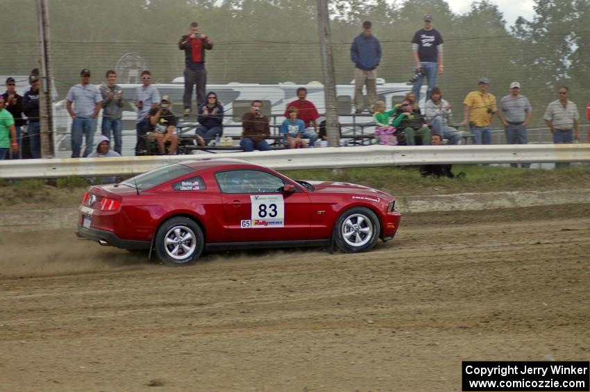 Mark Utecht / Rob Bohn cross the finish of SS1 in their Ford Mustang.