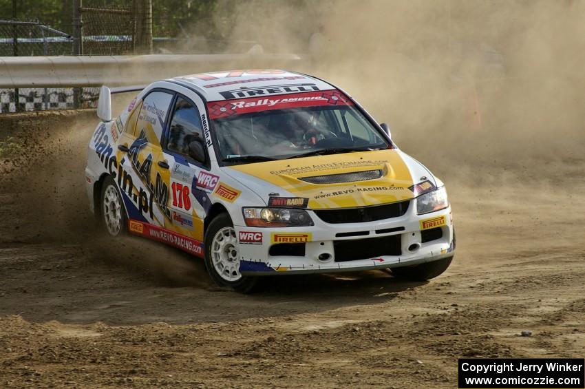 Andi Mancin / Maciej Wislawski throws his Mitsubishi Lancer Evo 9 sideways on a hairpin on SS1.