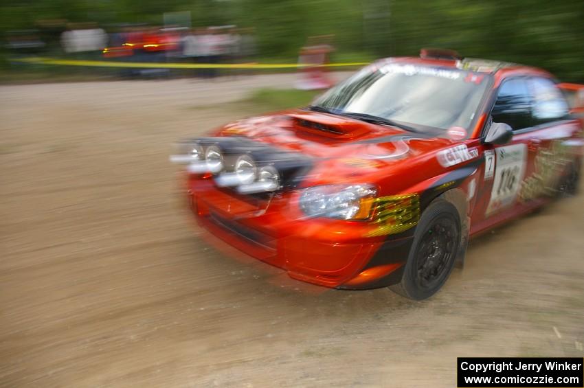 Nate Conley / Adam Kneipp at speed through a fast left-hander in their Subaru WRX STi on SS2.