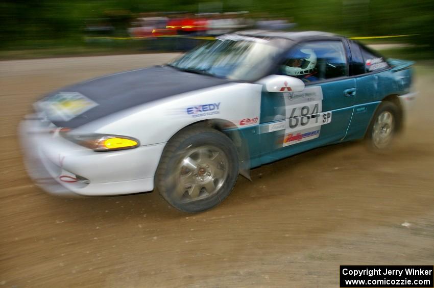 Adam Markut / Chris Gordon drift their Eagle Talon through a fast left-hander on SS2.