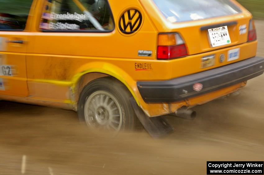 The Chad Eixenberger / Ben Slocum VW Golf sprays gravel at a fast left hander on SS2.