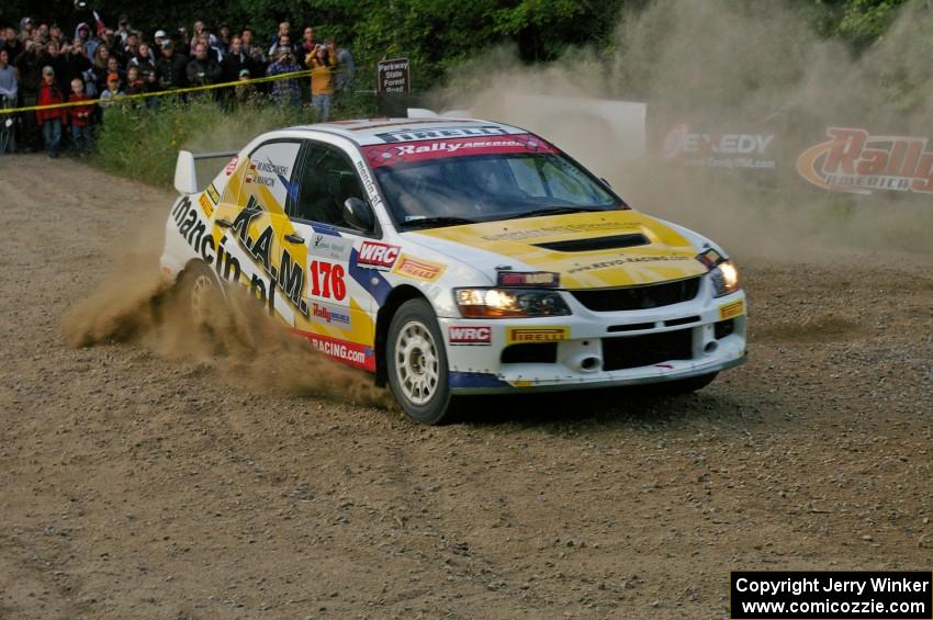 Andi Mancin / Maciej Wislawski	Mitsubishi Lancer Evo 9 at the SS4 spectator uphill hairpin.