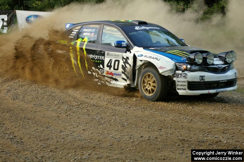 Dave Mirra / Derek Ringer prepare to head uphill at the spectator hairpin on SS4 in their Subaru WRX STi.