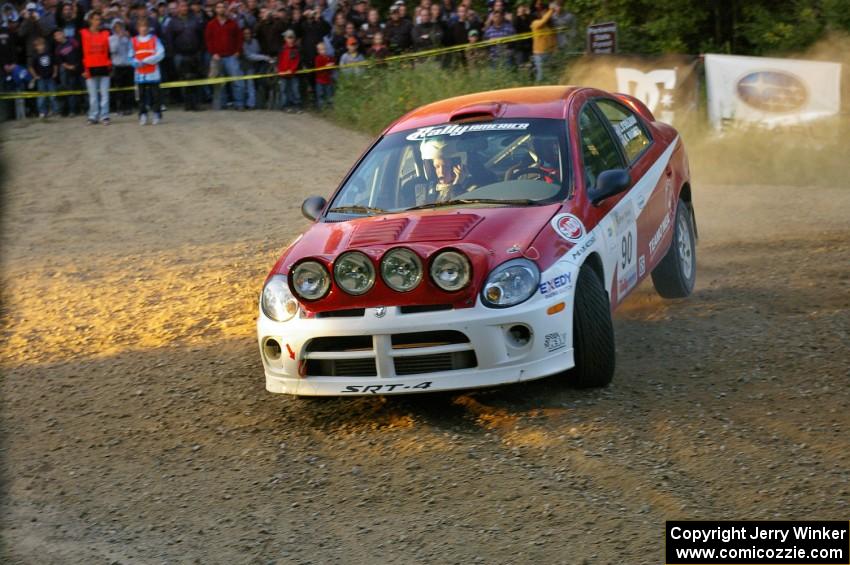 Lauchlin O'Sullivan / Karen Wagner fling their Dodge SRT-4 up onto three wheels at the hairpin on SS4.