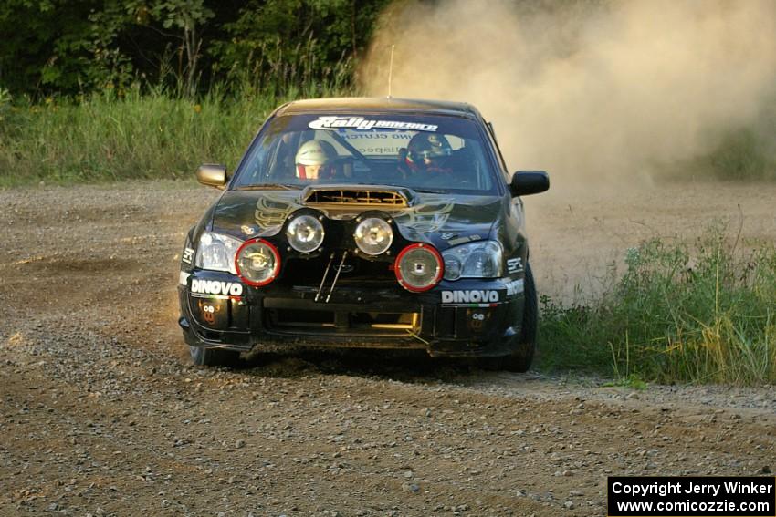 Pat Moro / Jeremy Wimpey drift their Subaru WRX STi through an uphill hairpin on SS4.
