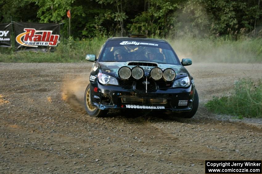 Mark Fox / Jake Blattner accelerate out of the uphill hairpin on SS4 in their Subaru WRX STi.