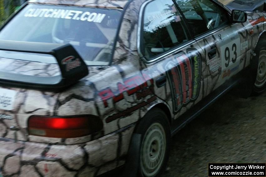 The Bob Olson / Conrad Ketelsen Subaru Impreza rockets uphill from the spectator hairpin on SS4.