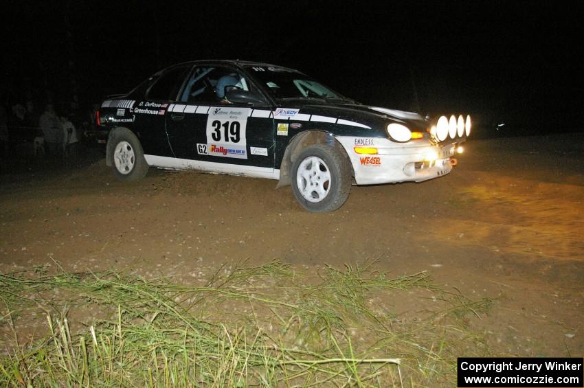 Chris Greenhouse / Don DeRose go a bit wide in their Plymouth Neon at the downhill hairpin on SS7.