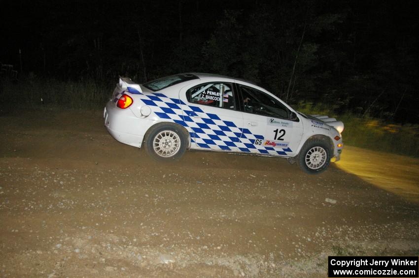 The Zach Babcock / Jack Penley Dodge SRT-4 at the downhill hairpin on SS7.