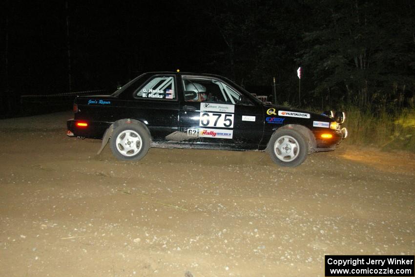 Ben Hanka / Greg Hanka drift wide at the downhill hairpin spectator location on SS7 in their Nissan Sentra SE-R.