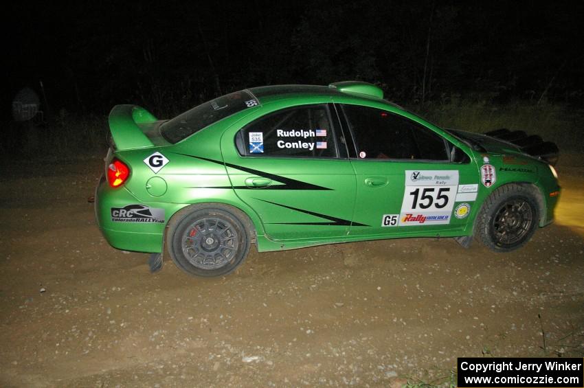 John Conley / Keith Rudolph drive their Dodge SRT-4 out of the downhill hairpin on SS7.