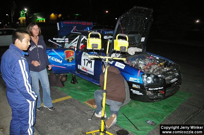 The Carl Siegler / David Goodman Subaru WRX STi gets prepared for day two after having an off on SS3 near the finish.