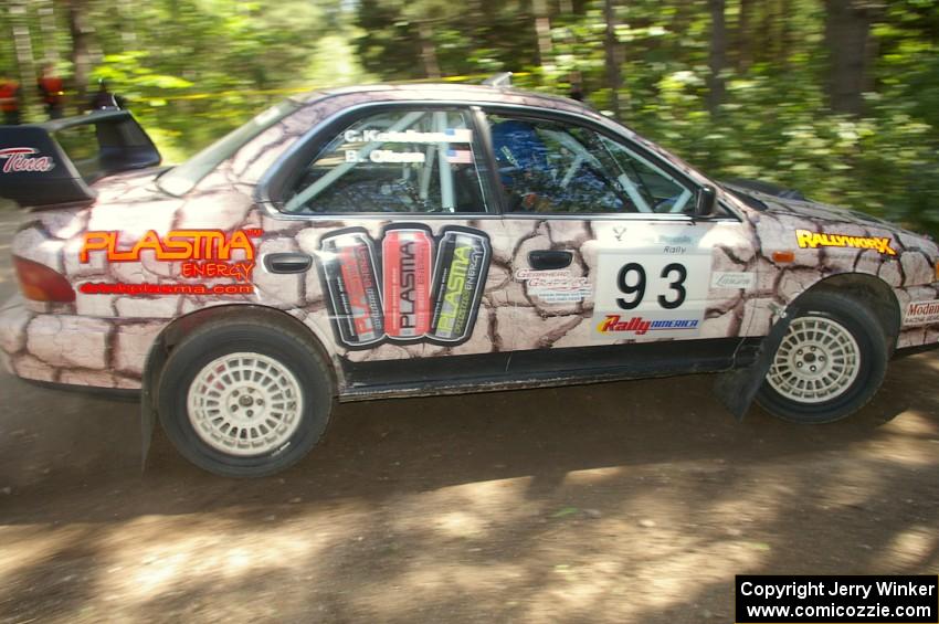 The Bob Olson / Conrad Ketelsen Subaru Impreza rockets out of a right-hander on SS8.