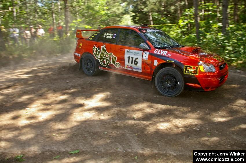Nate Conley / Adam Kneipp drift wide in their Subaru WRX STi on SS8.