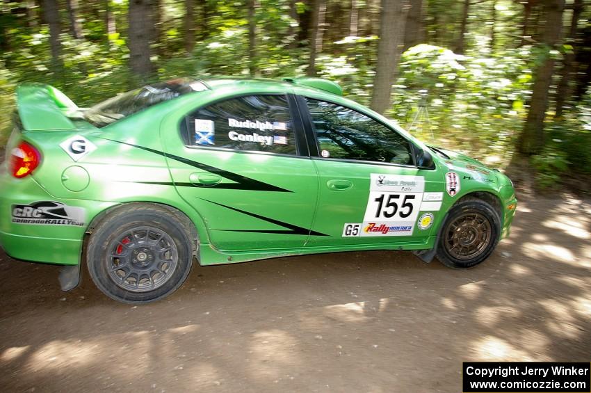 John Conley / Keith Rudolph drive their Dodge SRT-4 out of a right-hander of SS8.