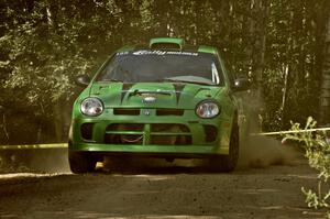 John Conley / Keith Rudolph drive their Dodge SRT-4 out of a right-hander on SS11.
