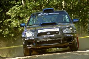 Carl Siegler / David Goodman in their Subaru WRX STi at a right hander on SS11.