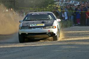 Adam Markut / Chris Gordon drift their Eagle Talon through the spectator-filled corner on SS12.