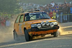 The Chad Eixenberger / Ben Slocum VW Golf takes a hard right onto the county road on SS12.