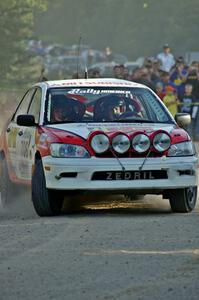 Jan Zedril / Jody Zedril come onto the county road spectator location on SS12 in their Mitsubishi Lancer ES.