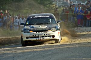 Chris Greenhouse / Don DeRose drift onto the county road at the spectator point on SS12 in their Plymouth Neon.