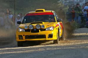 Don Conley / Chris Herlache power their Subaru WRX Wagon out of the spectator corner on SS12.