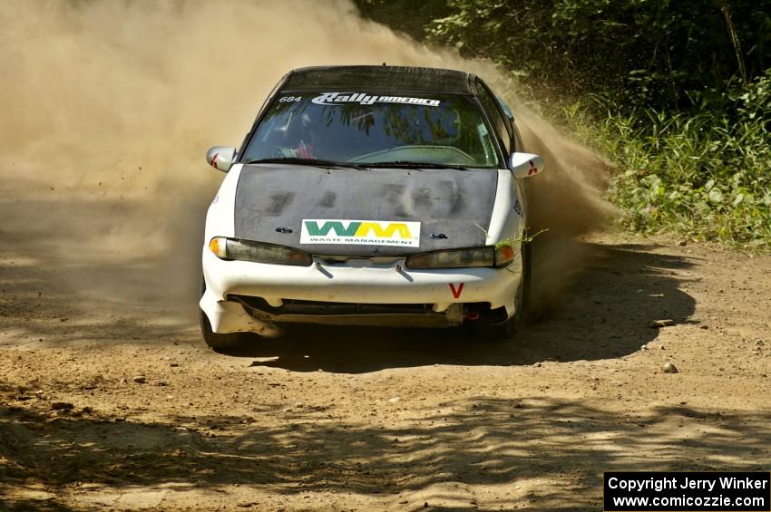 Adam Markut / Chris Gordon drift their Eagle Talon through an uphill 90-right on SS11.