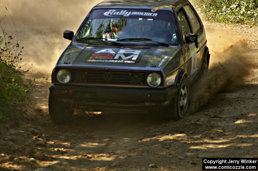 Chris Duplessis / Catherine Woods blast their VW GTI through a 90-right on SS11.