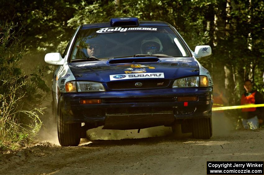 The Mason Moyle / Scott Putnam Subaru Impreza comes out of a 90 right on SS11.