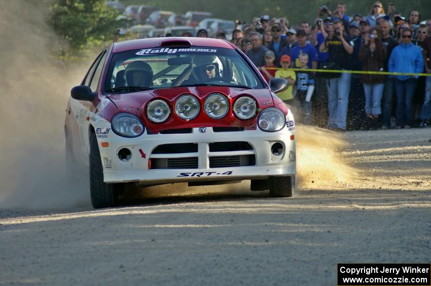 Lauchlin O'Sullivan / Karen Wagner drive their Dodge SRT-4 past spectators on SS12.