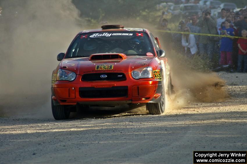 Nate Conley / Adam Kneipp drift their Subaru WRX STi past spectators on SS12.