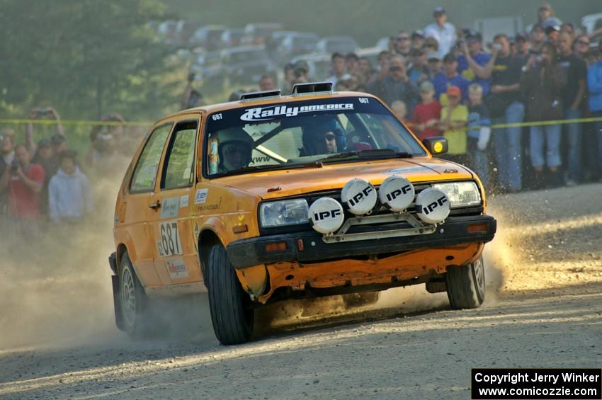 The Chad Eixenberger / Ben Slocum VW Golf takes a hard right onto the county road on SS12.