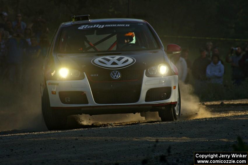 The VW GTI-Rally of Brian Dondlinger / Dave Parps comes onto the county road at the SS12 spectator point.