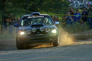 Carl Siegler / David Goodman flog their Subaru WRX STi at the spectator point on SS12.