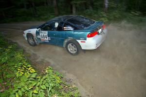 Adam Markut / Chris Gordon beautifully drift their Eagle Talon through a sweeper on SS15.