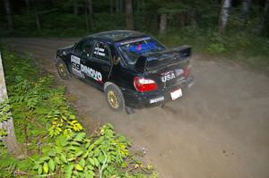 Pat Moro / Jeremy Wimpey drift their Subaru WRX STi through a sweeper on SS15.