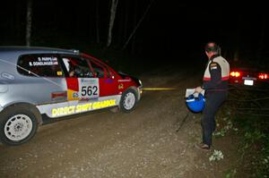 The Mark Utecht / Rob Bohn Ford Mustang is pulled out after being high-centered by the Brian Dondlinger/ Dave Parps VW GTI-