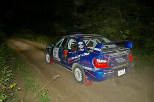 Carl Siegler / David Goodman limp their Subaru WRX STi uphill on SS15.