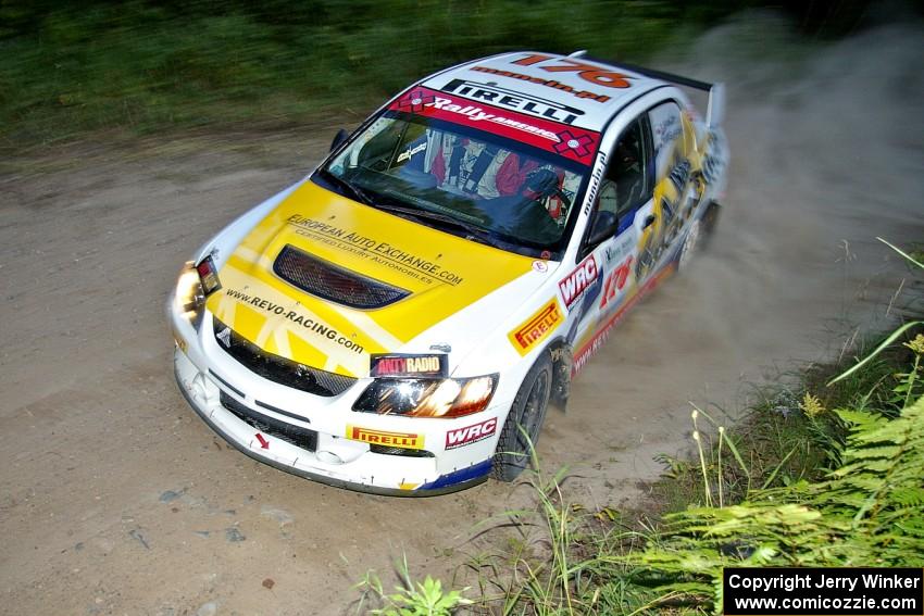 Andi Mancin / Maciej Wislawski flog their Mitsubishi Lancer Evo 9 through left sweeper on SS15.