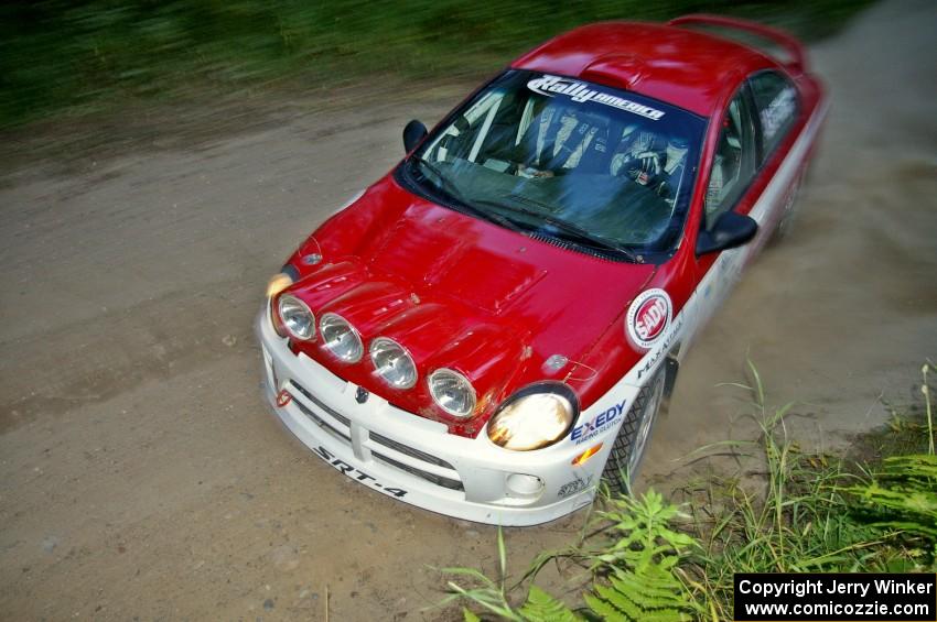 Lauchlin O'Sullivan / Karen Wagner beautifully drift their Dodge SRT-4 through a sweeper on SS15.