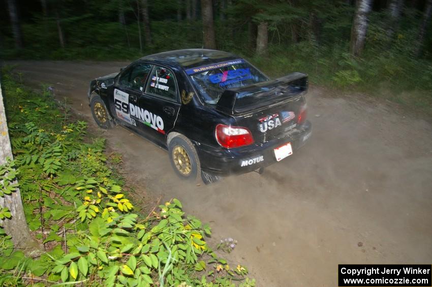 Pat Moro / Jeremy Wimpey drift their Subaru WRX STi through a sweeper on SS15.