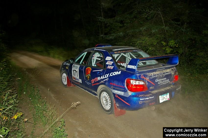 Carl Siegler / David Goodman limp their Subaru WRX STi uphill on SS15.