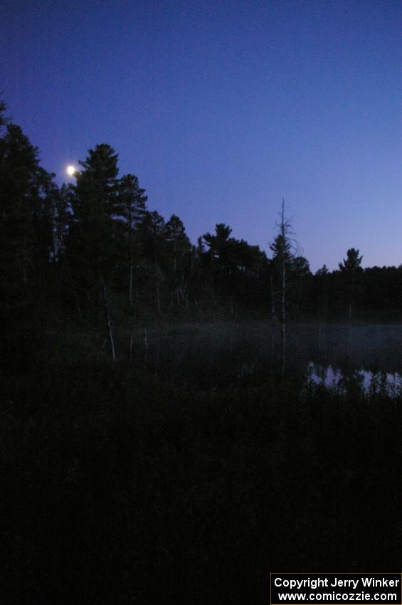 Moonrise over a lake on SS15 after the stage is run.