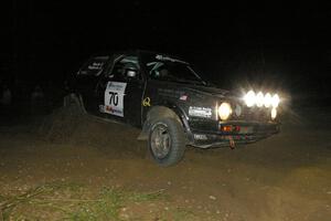 Chris Duplessis / Catherine Woods kick their VW GTI sideways on the downhill hairpin on SS7.