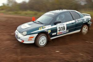 Chris Greenhouse / Don DeRose take a tight hairpin on the practice stage in their Plymouth Neon.