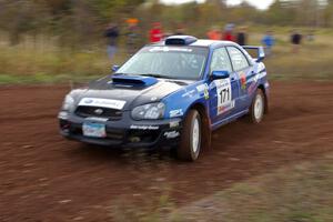 Carl Siegler / David Goodman drift through a tight corner on the practice stage in their Subaru WRX STi.