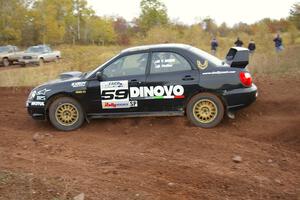 Pat Moro / Ole Holter drift through a tight corner on the practice stage in their Subaru WRX STi.