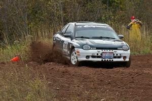 Chris Greenhouse / Don DeRose through a tight corner on the practice stage in their Plymouth Neon.