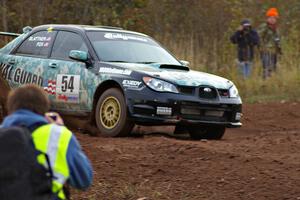 Lars Gagne takes a shot of the Mark Fox / Jake Blattner Subaru WRX STi at the practice stage.