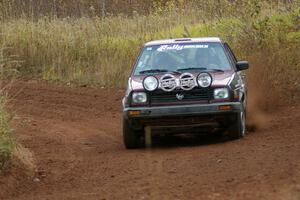 Matt Bushore / Andy Bushore at speed through a sweeper on the practice stage in their VW Jetta.